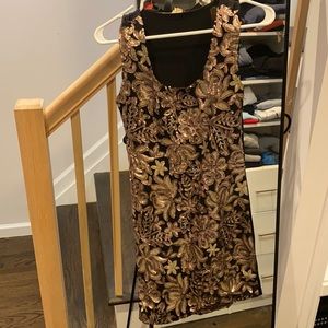 Gold and black sequins dress